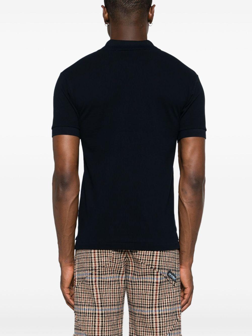 Polo nera con logo ricamato 