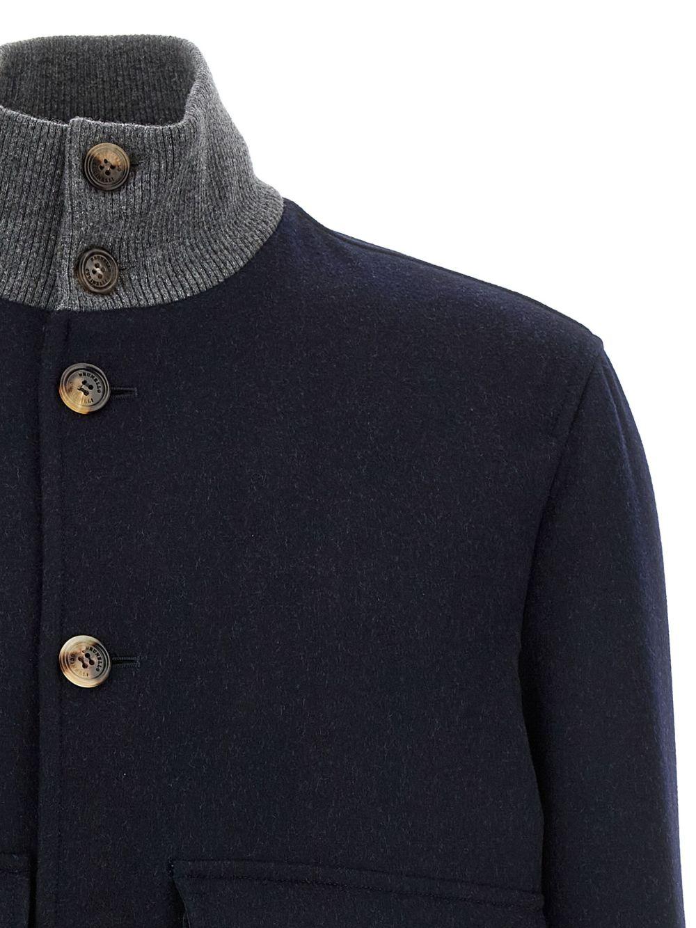Bomber navy con bottoni e tasche con patta 
