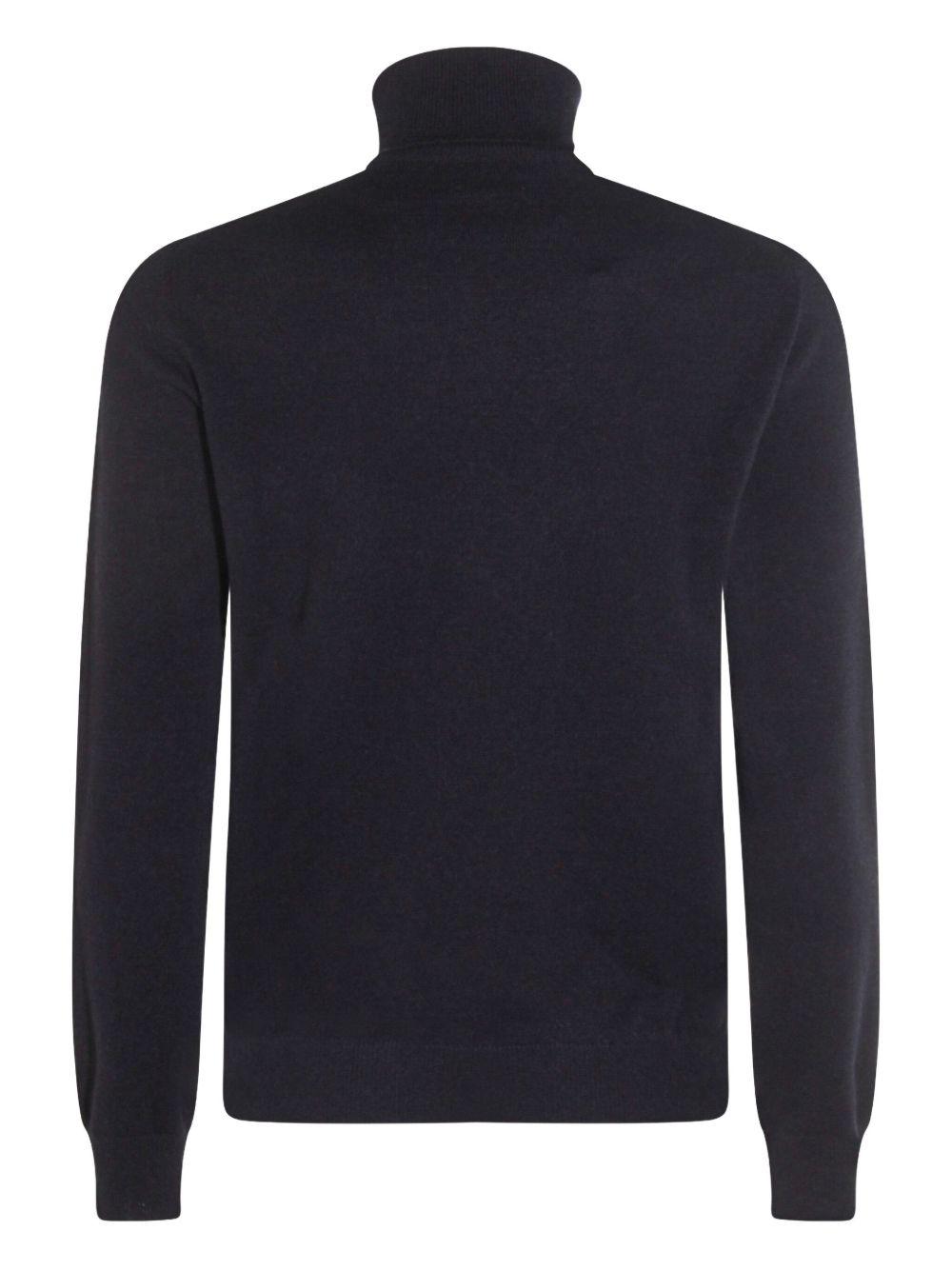 Maglione blu scuro a coste a collo alto 