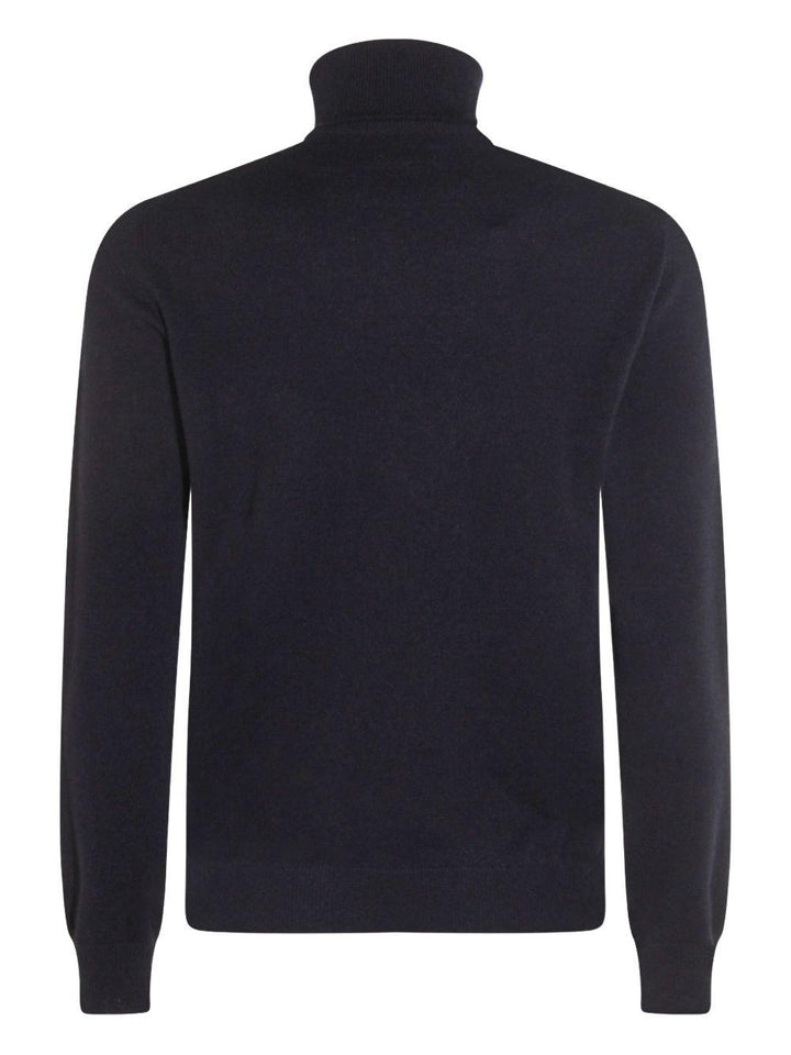 Maglione blu scuro a coste a collo alto 