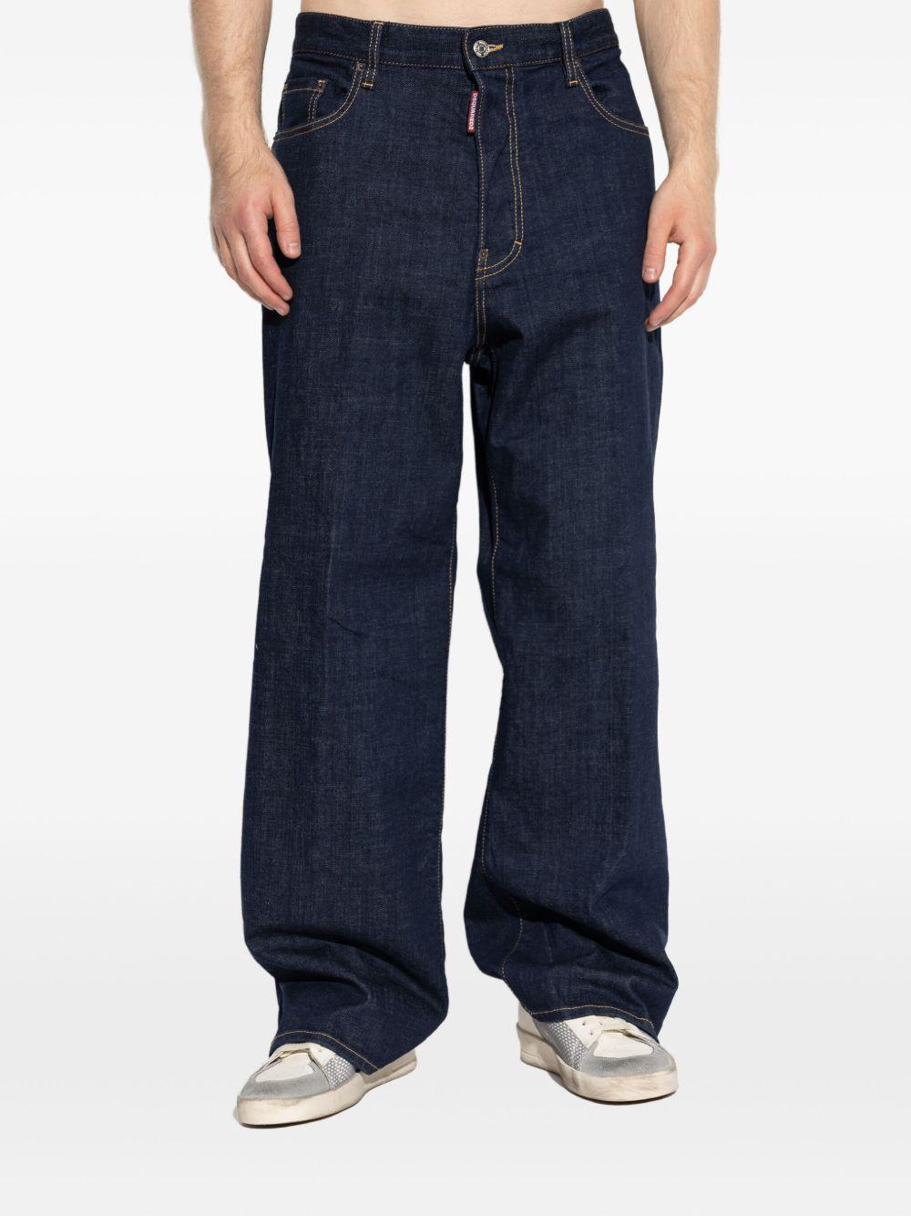 Jeans blu navy a gamba ampia con cuciture a contrasto 