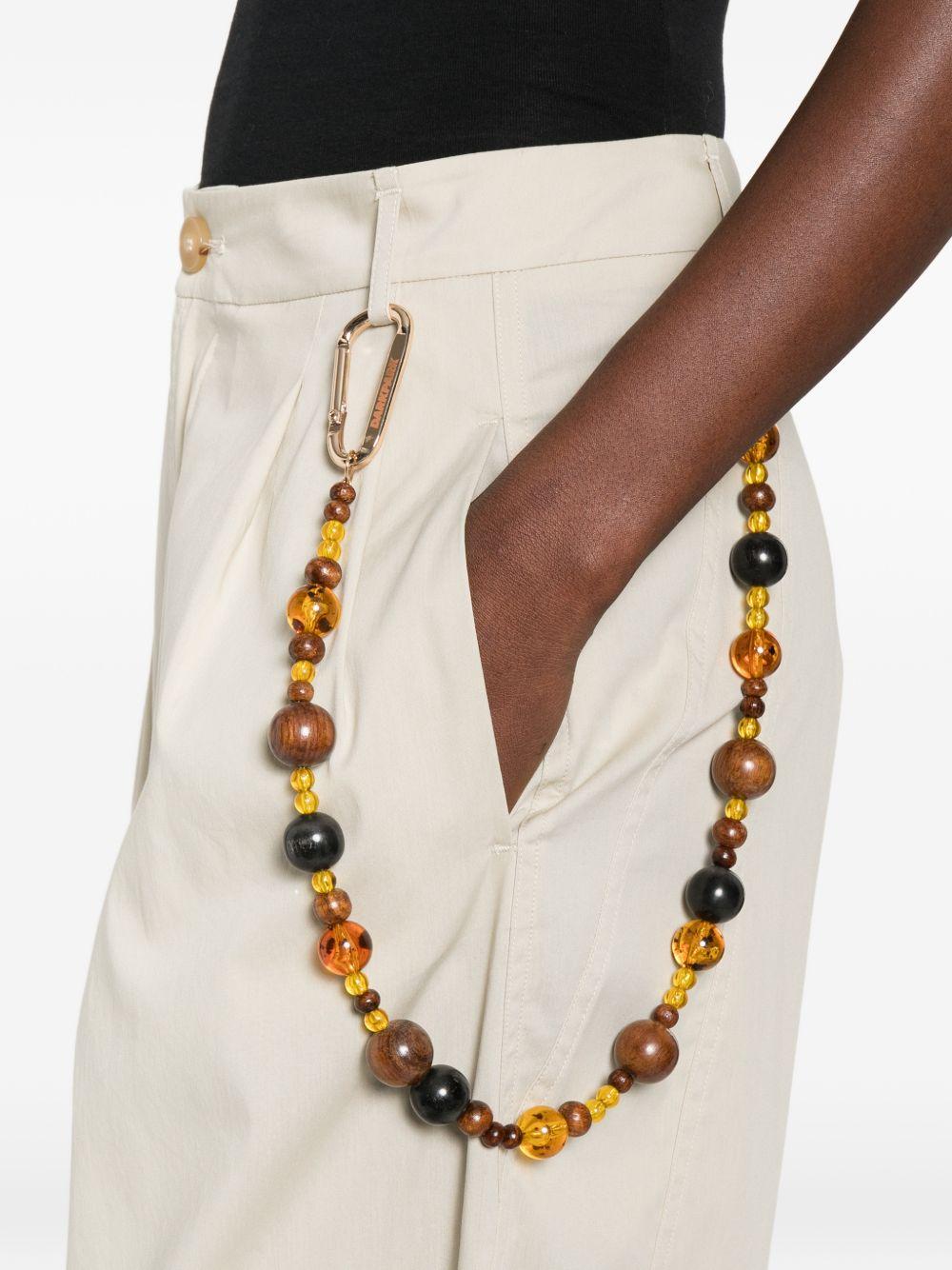 Pantaloni con perline 