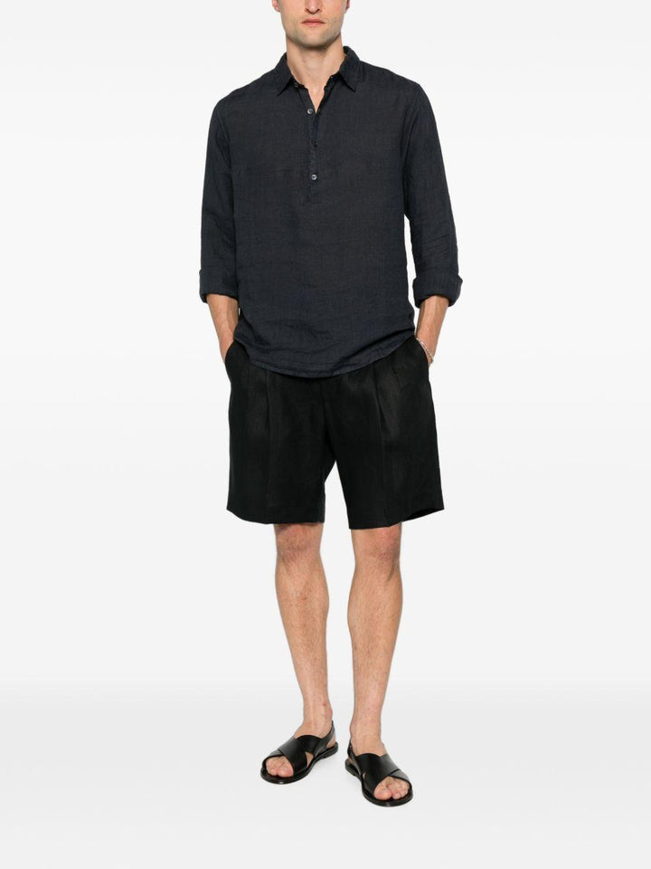 Shorts neri con pieghe 