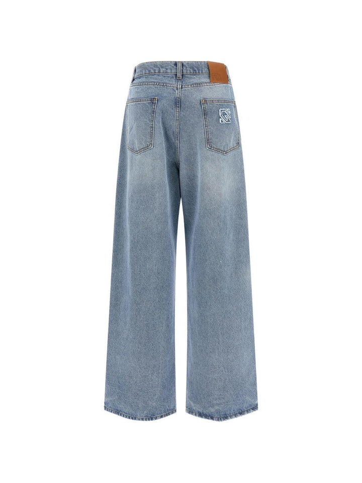 Jeans con applicazioni di cristalli 