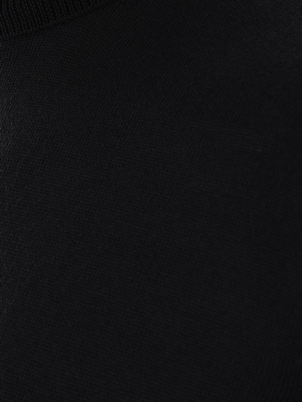Maglione nero a collo alto in lana merino 