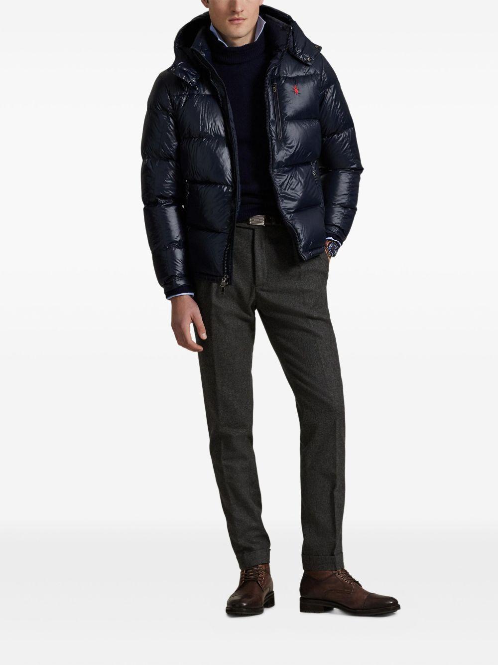 Piumino blu navy con cappuccio 