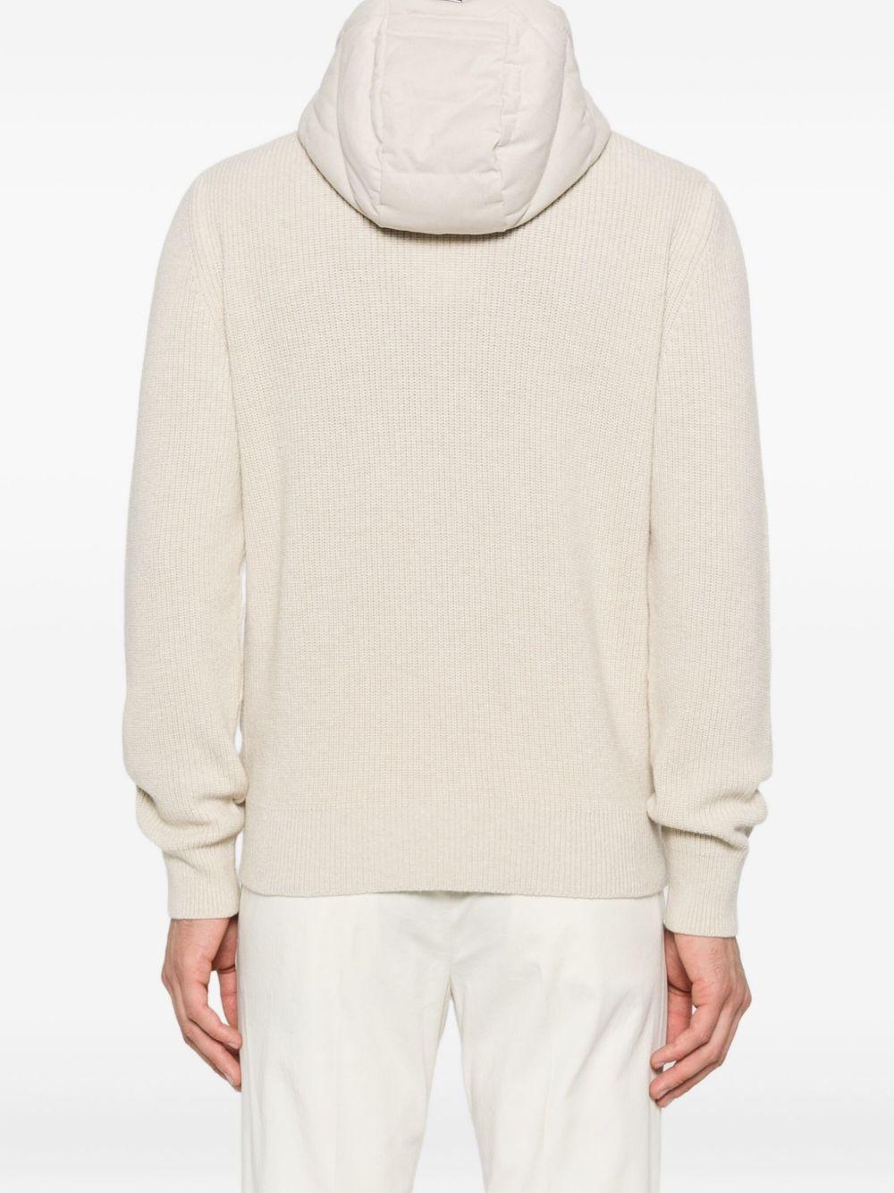 Piumino trapuntato beige con cappuccio 