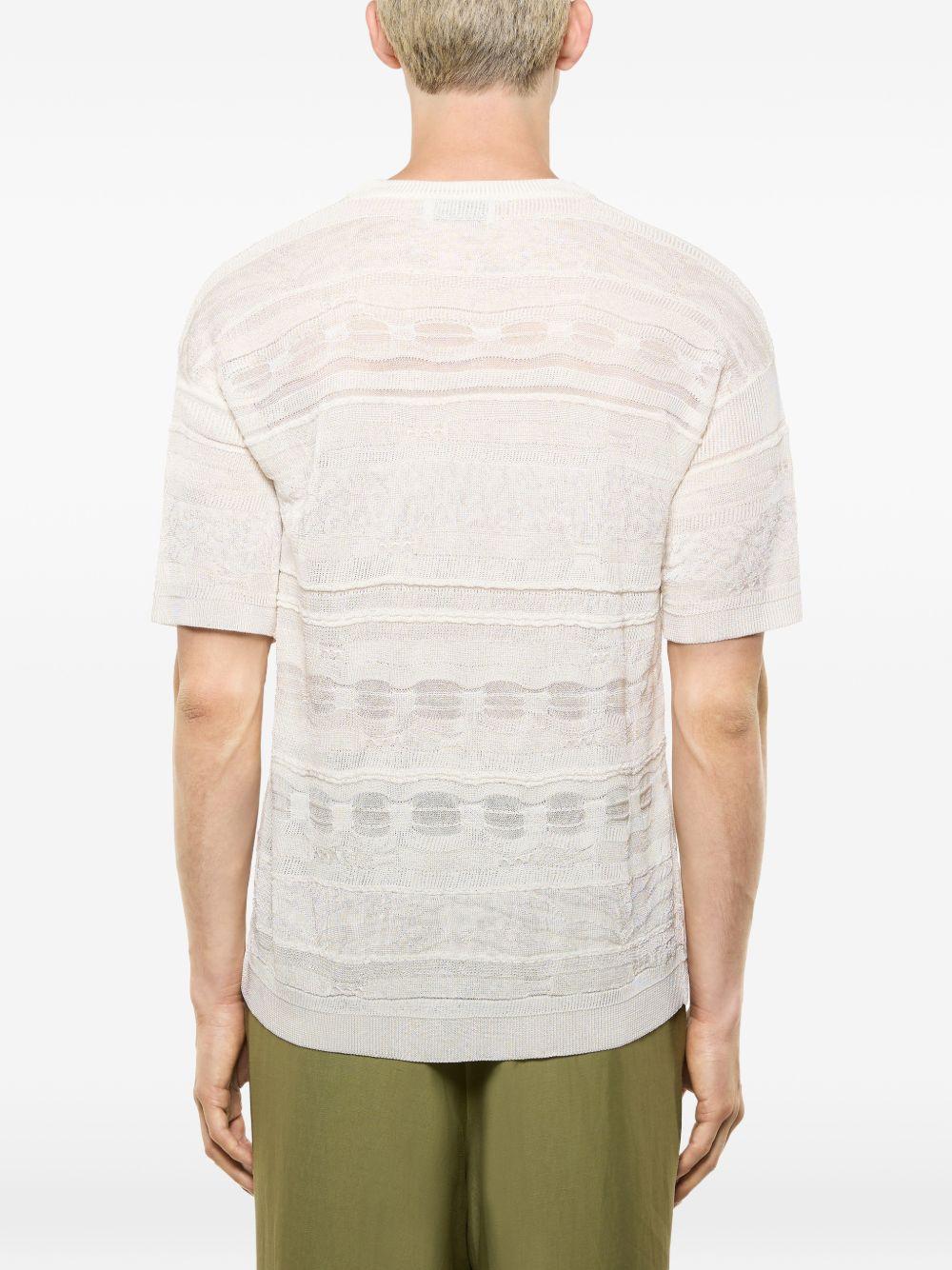 T-shirt panna in maglia con trasparenze 