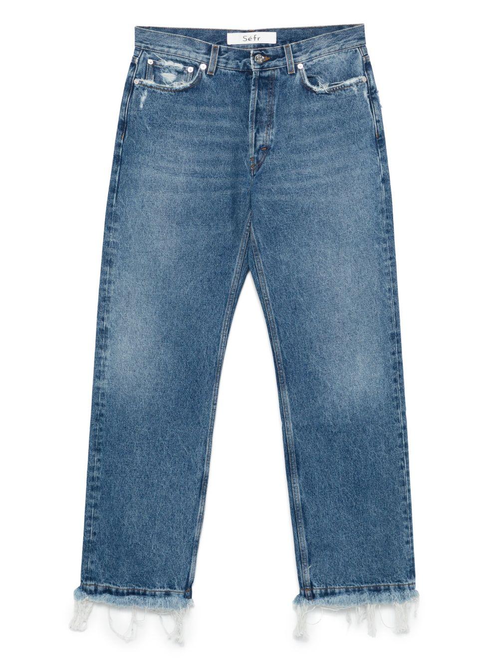 Jeans blu con frange 