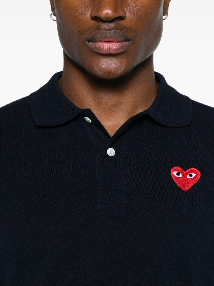 Polo nera con logo ricamato 
