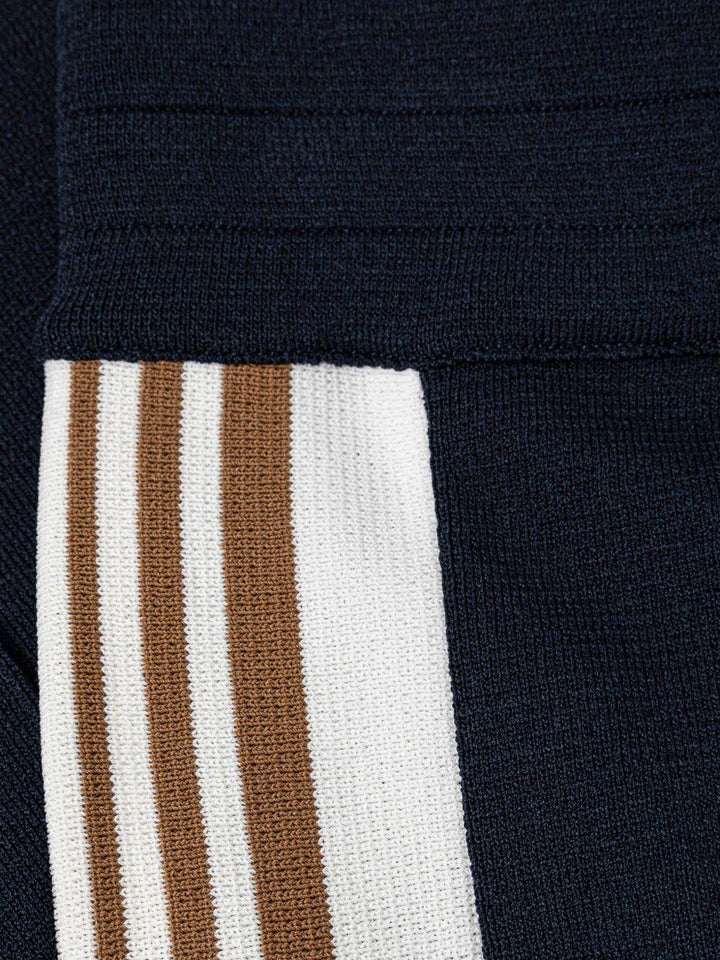 Pantaloni sportivi blu con bande 