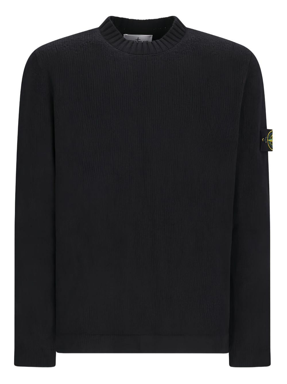 Maglione nero a coste con applicazione Compass
