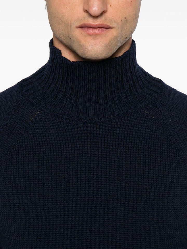 Maglione nero in lana a collo alto 