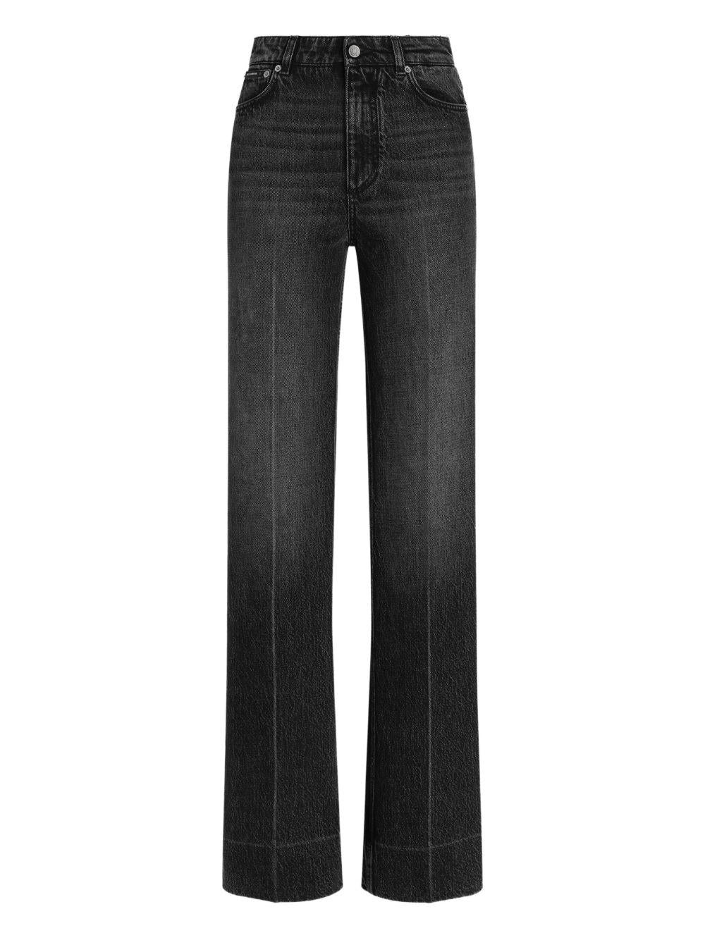 Jeans con placca logo 