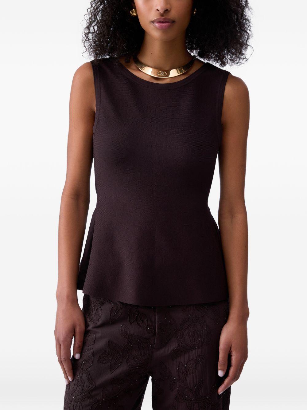 Top con dettaglio cut-out 