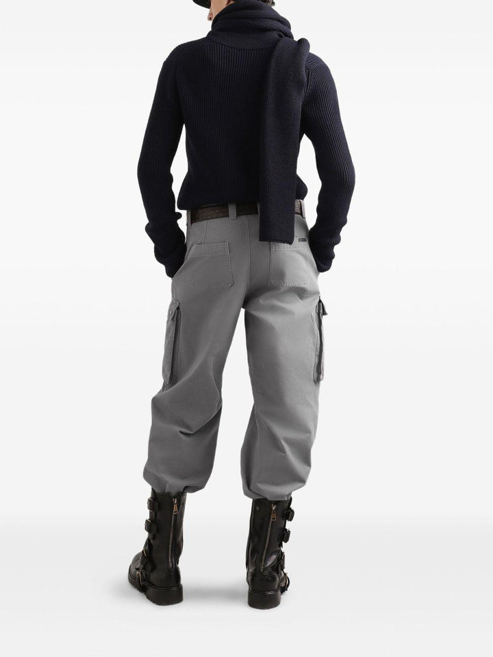 Maglione blu con mezza zip e logo 
