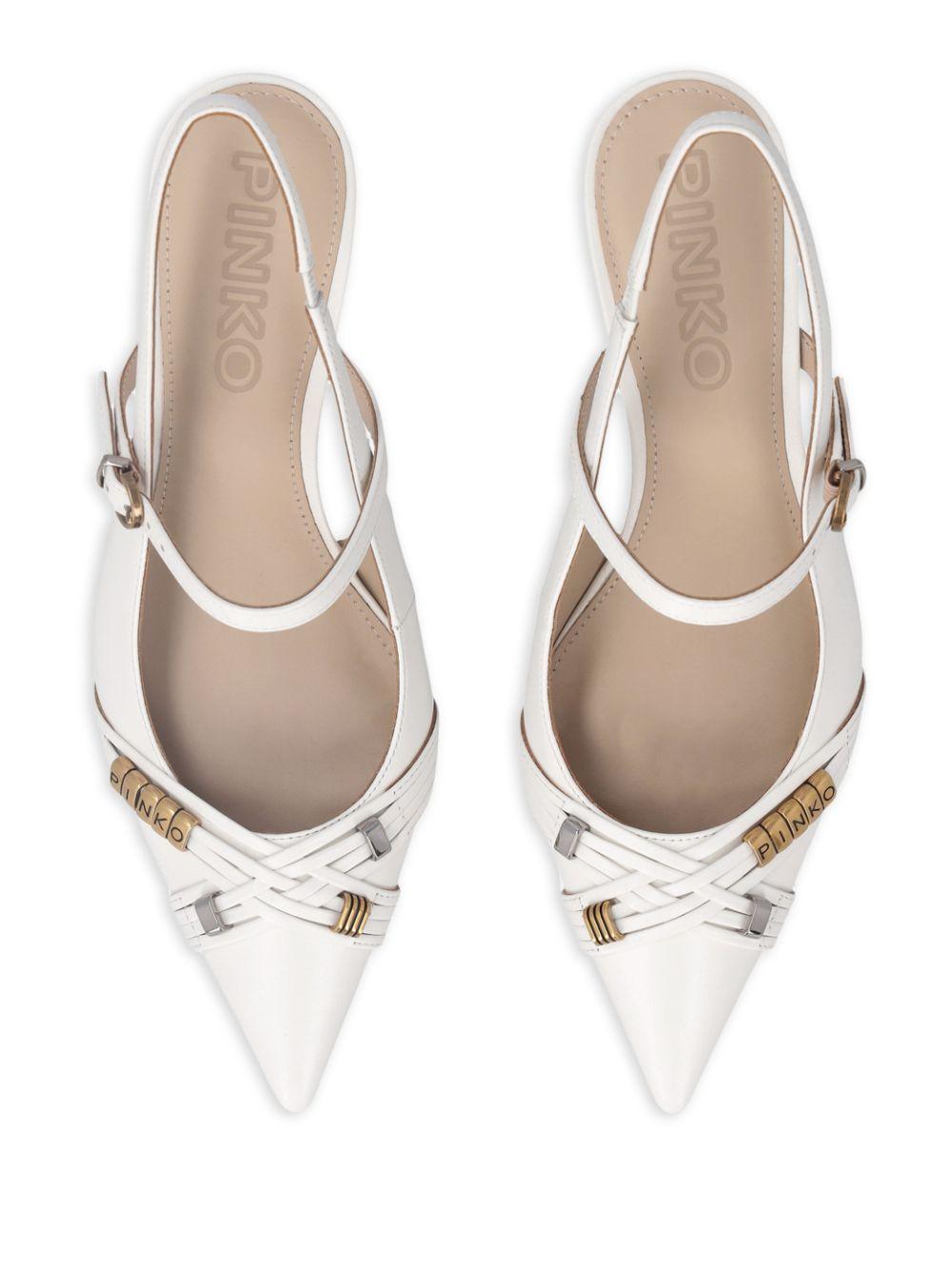 Pumps con cinturino posteriore 