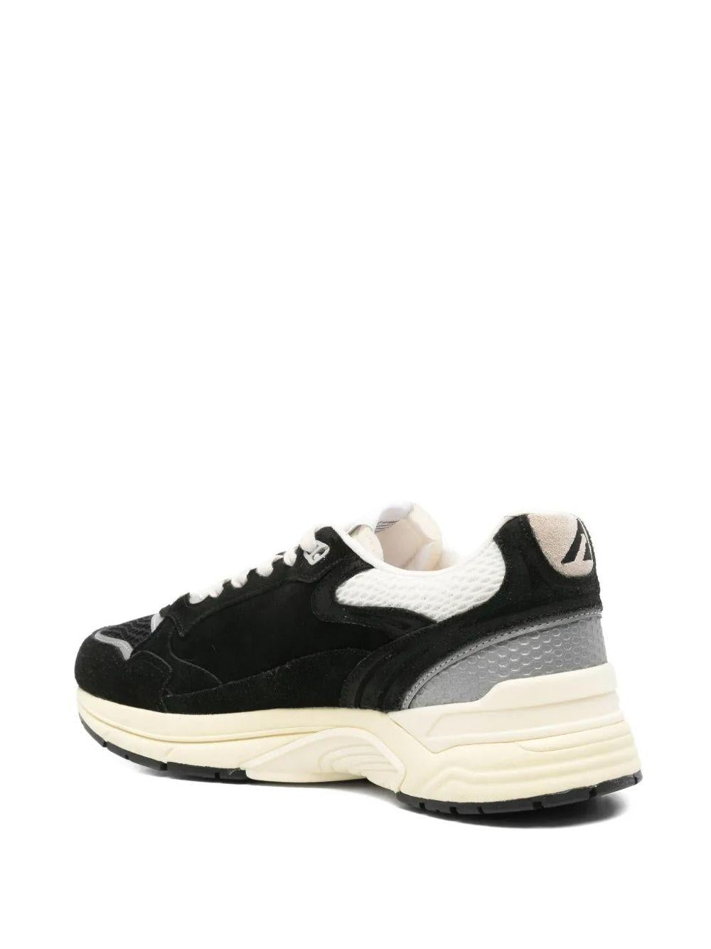 Sneakers nere con inserti 