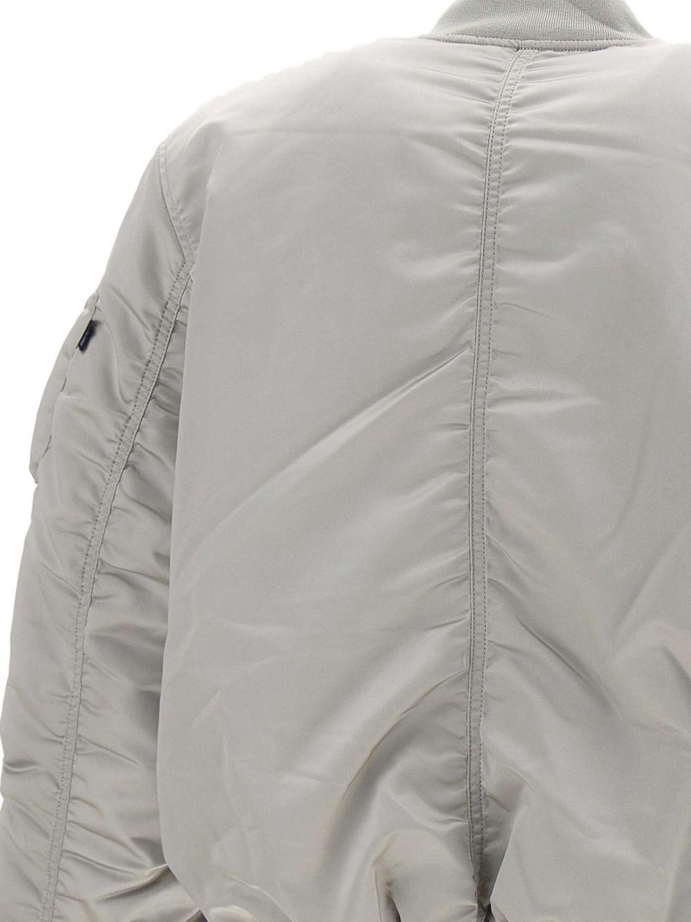 Bomber grigio con zip 