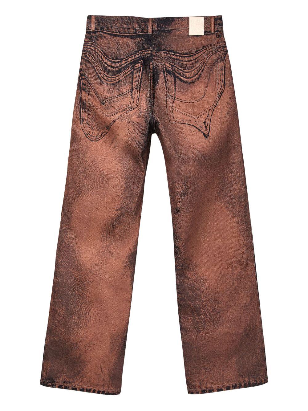 Jeans con lavaggio marrone 