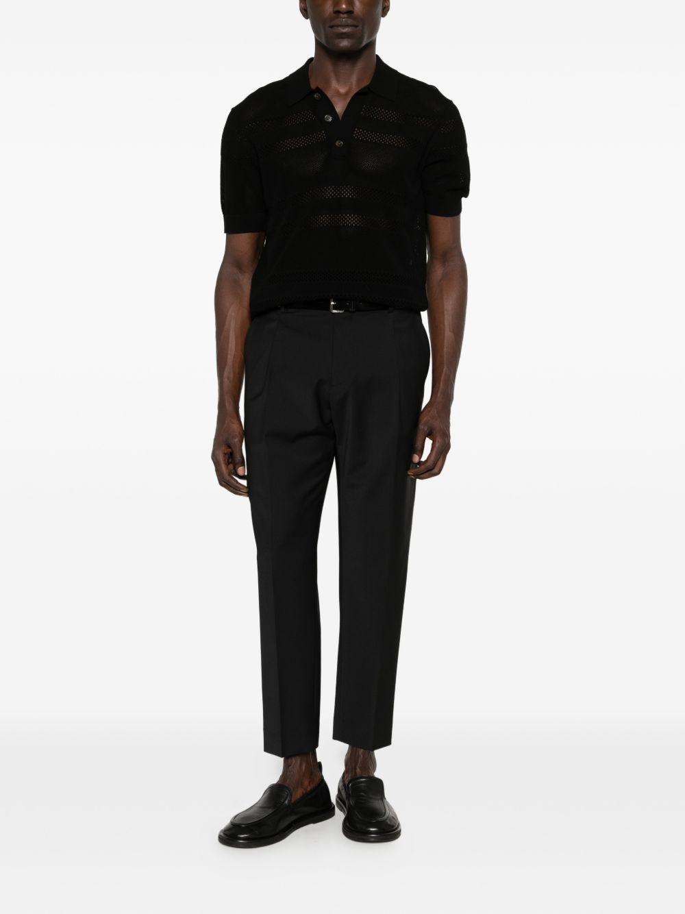 Pantaloni neri con pieghe 