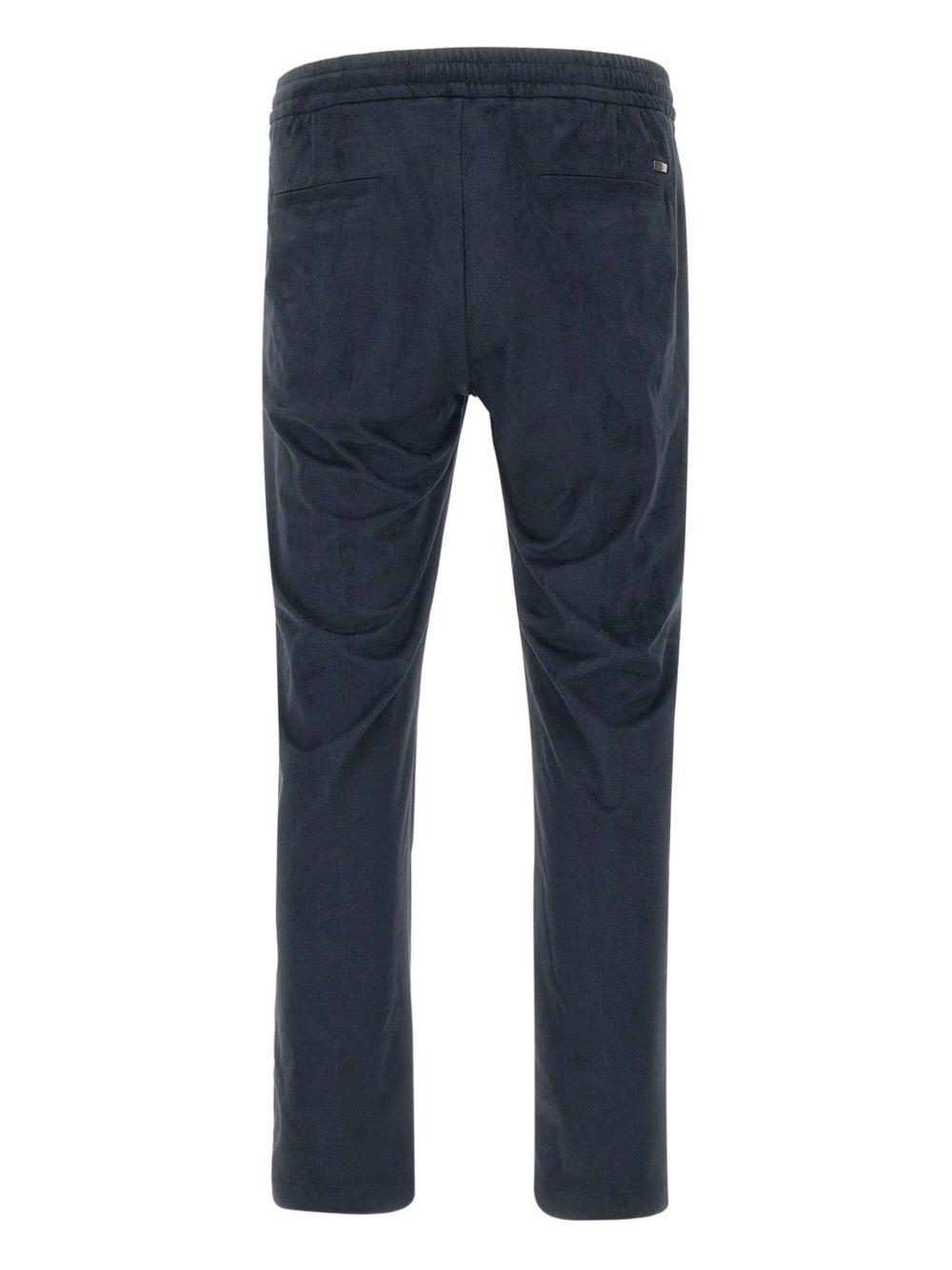 Pantaloni blu notte con pieghe e vita elasticizzata 