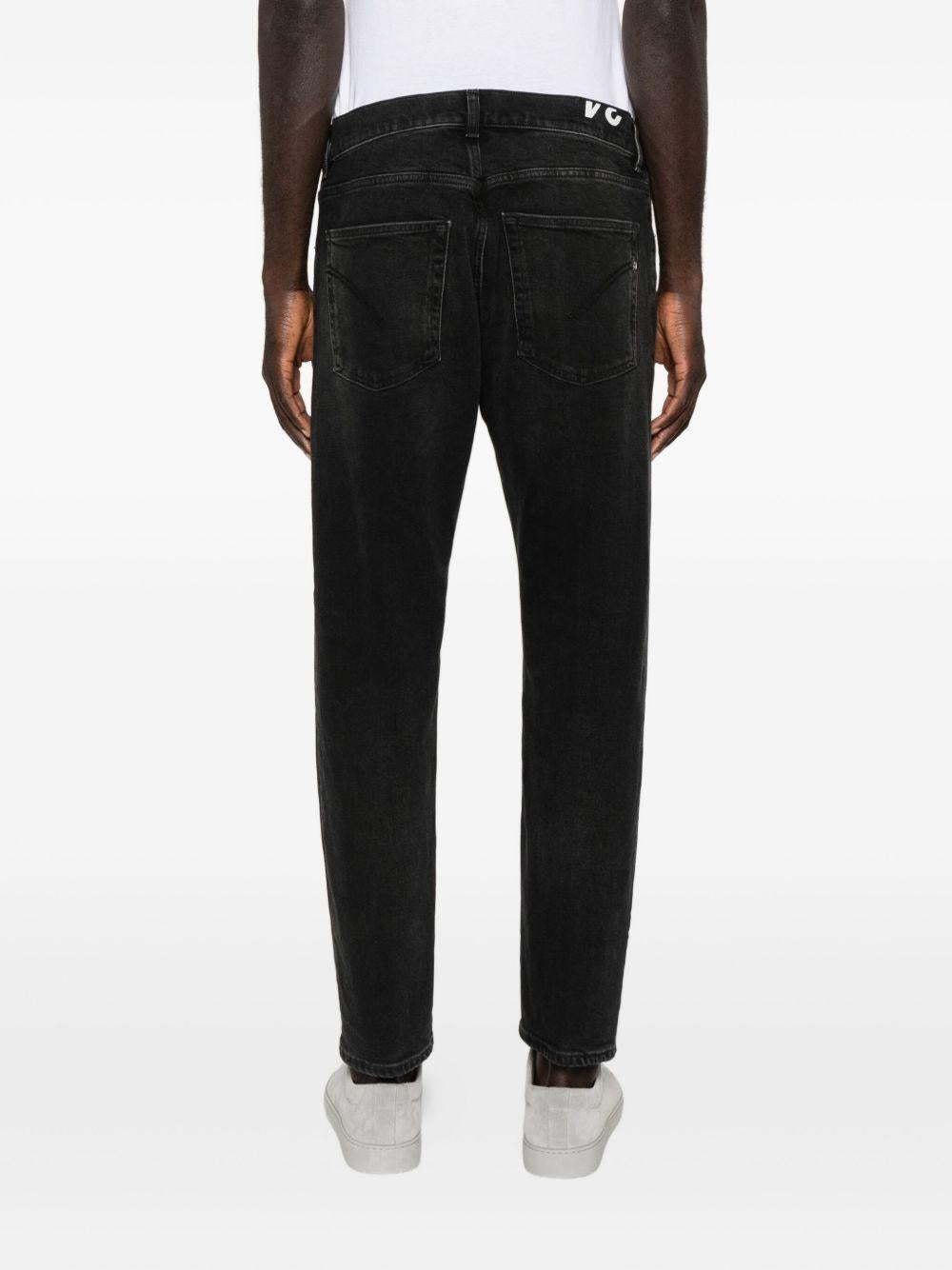 Jeans neri con baffatura 