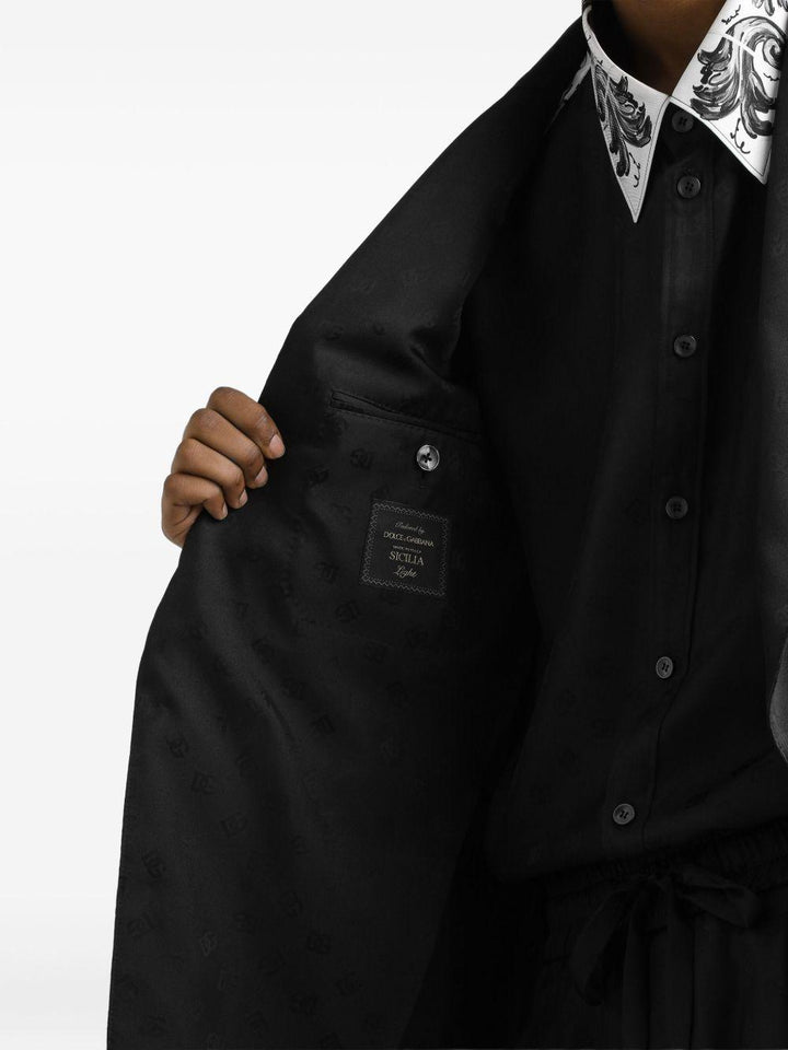Blazer nero con logo jacquard 