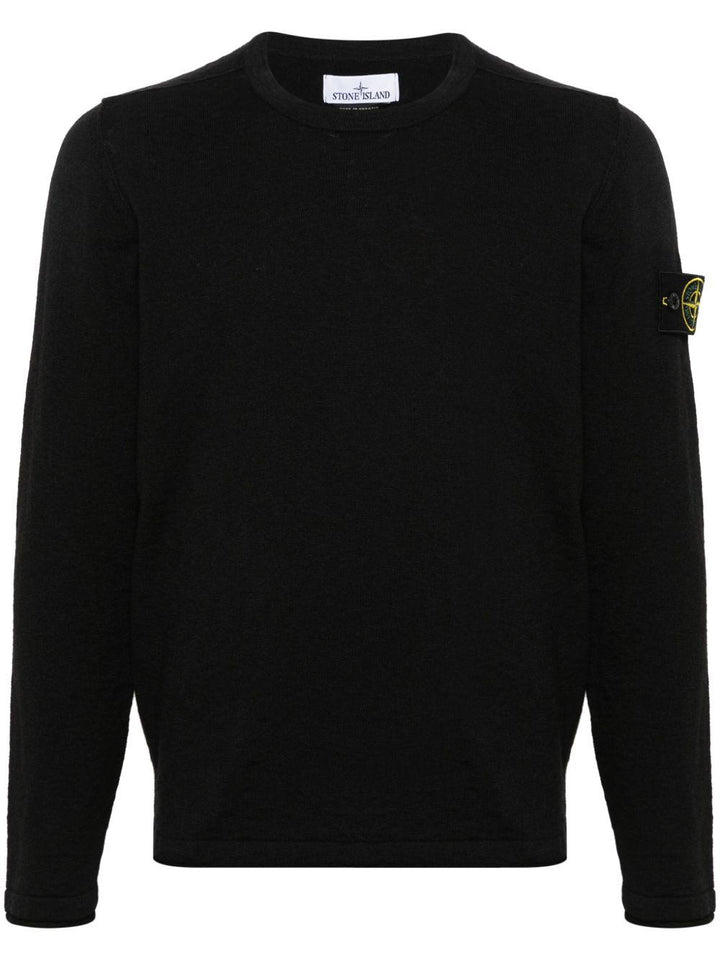 Maglione nero con applicazione 