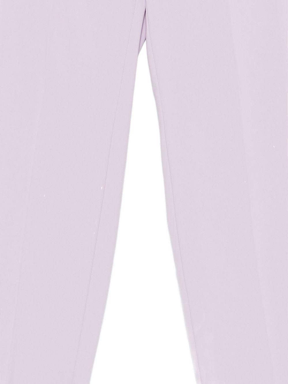 Pantaloni con bottoni 
