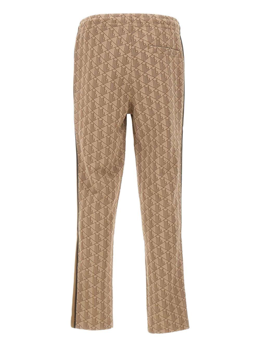 Pantaloni marroni con monogramma 