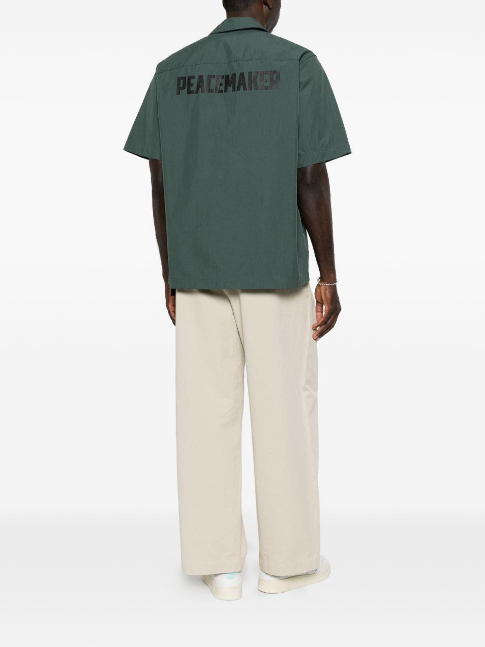 Camicia a maniche corte con stampa Peacemaker verde scuro 