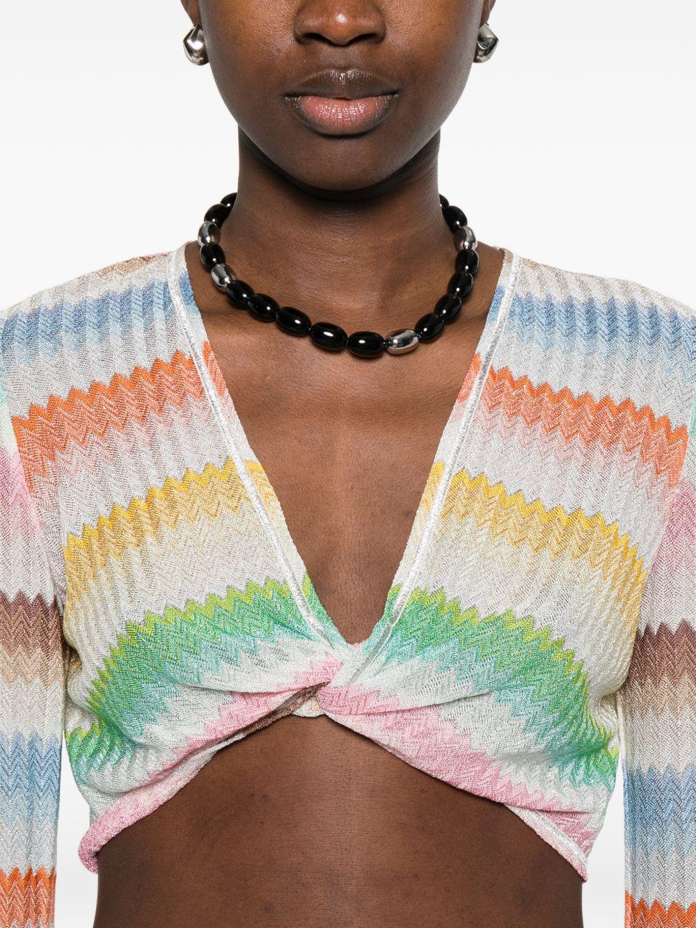 Crop top con nodo 