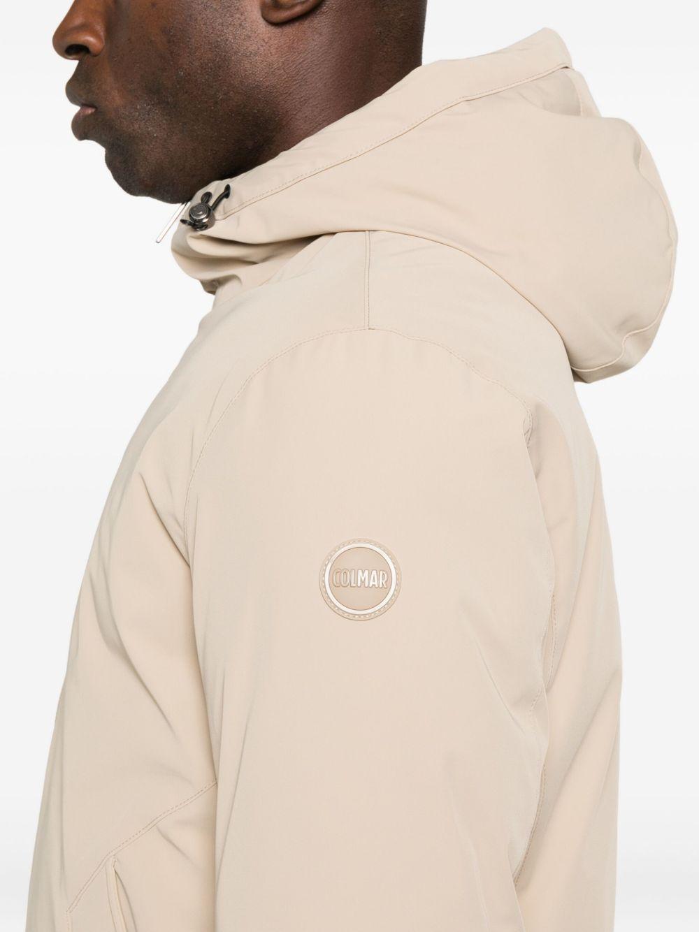 Giacca beige con zip 