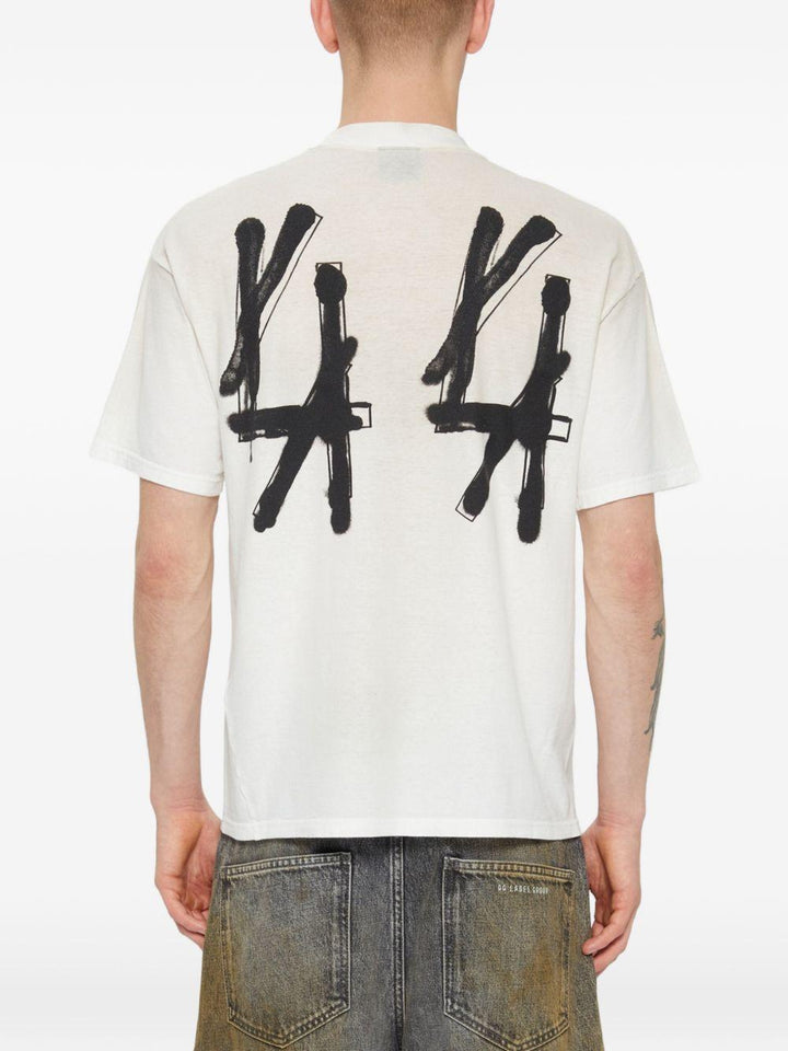 T-shirt bianca e nera in jersey con logo 