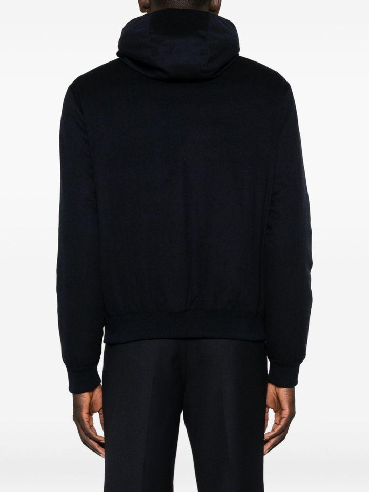 Giubbino  blu con zip e cappuccio 