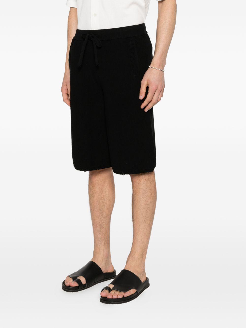 Shorts neroi in maglia con coulisse 
