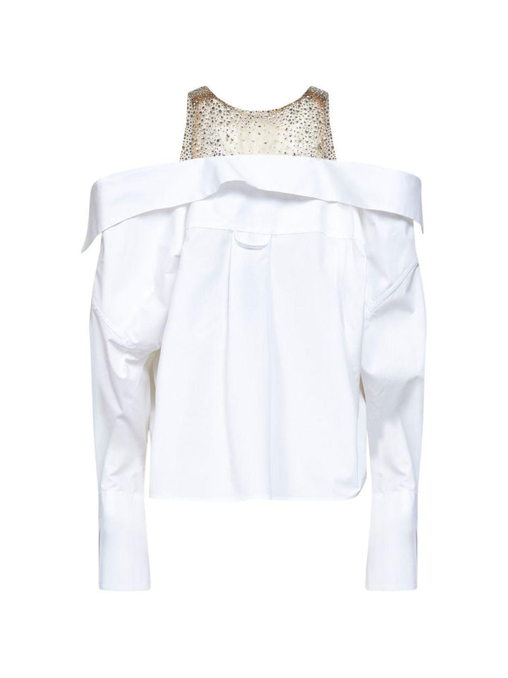 Blusa con spalle scoperte 
