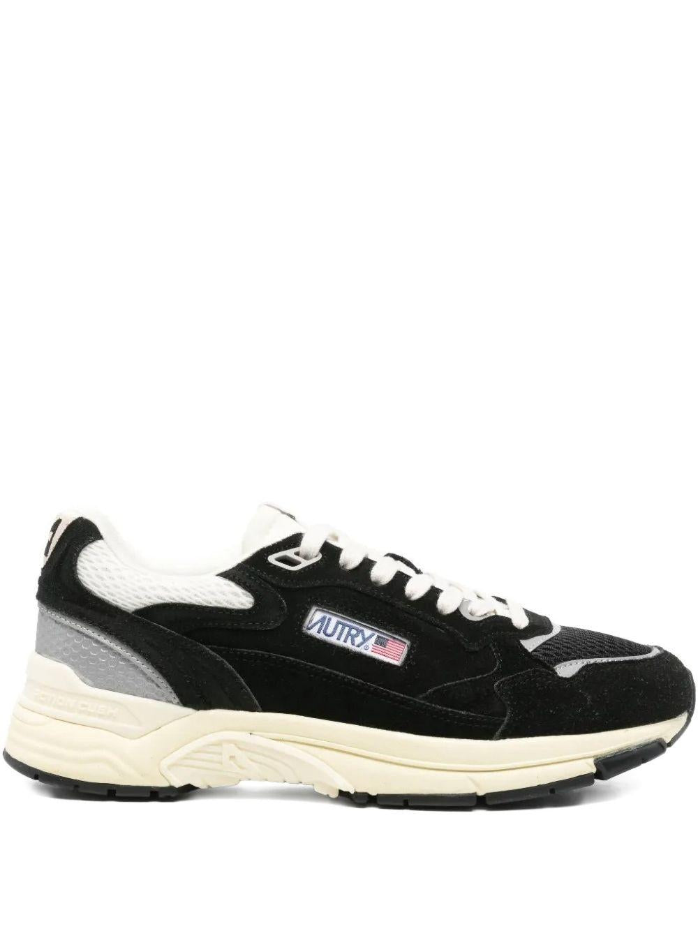 Sneakers nere con inserti 