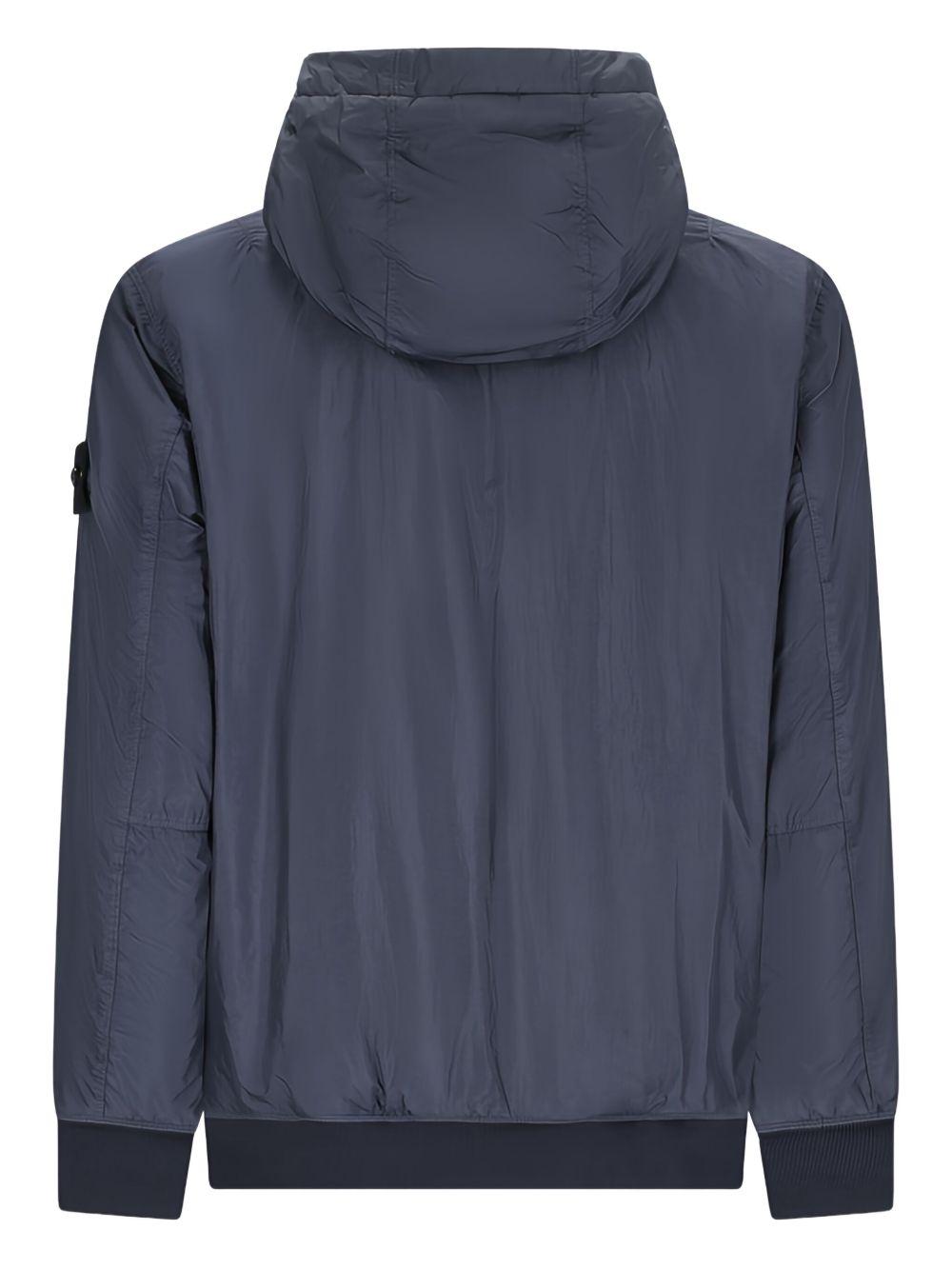 Bomber blu con cappuccio e applicazione Compass 