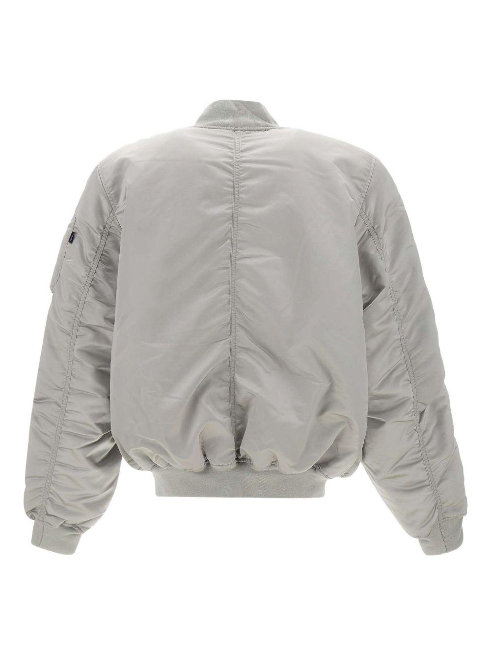 Bomber grigio con zip 