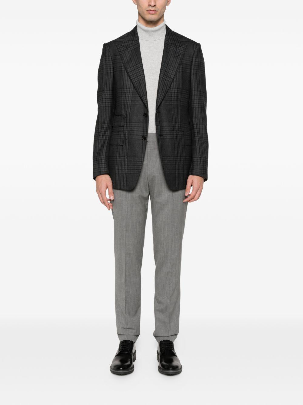 Pantaloni grigi con chiusura nascosta 