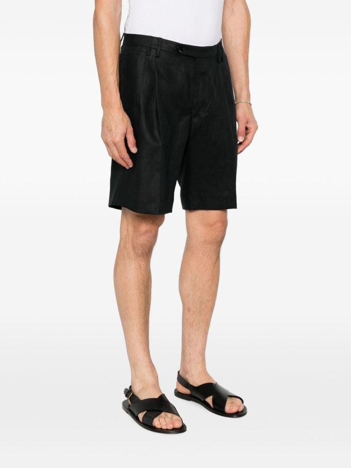 Shorts neri con pieghe 