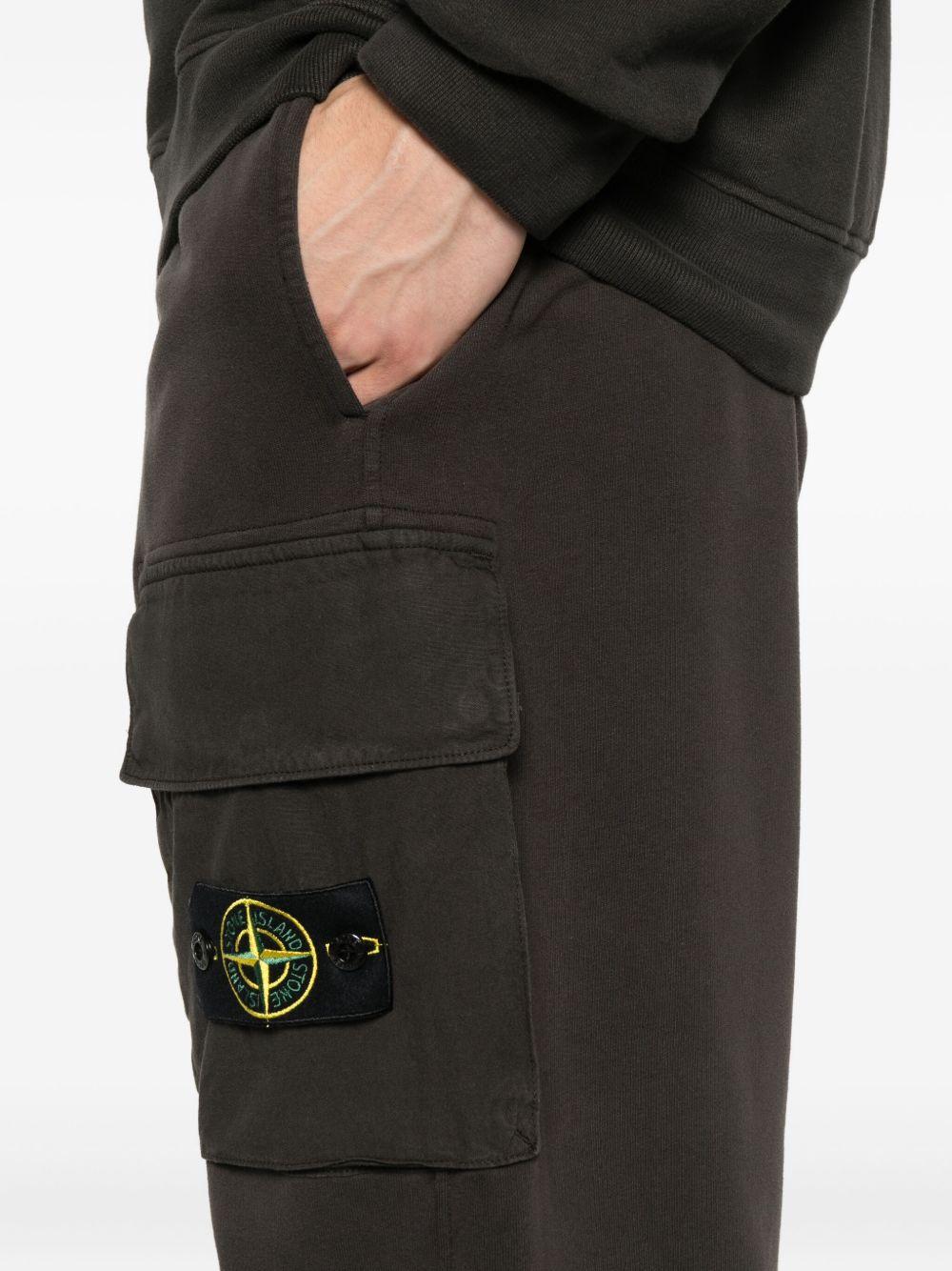 Pantaloni sportivi grigio scuro con applicazione logo 