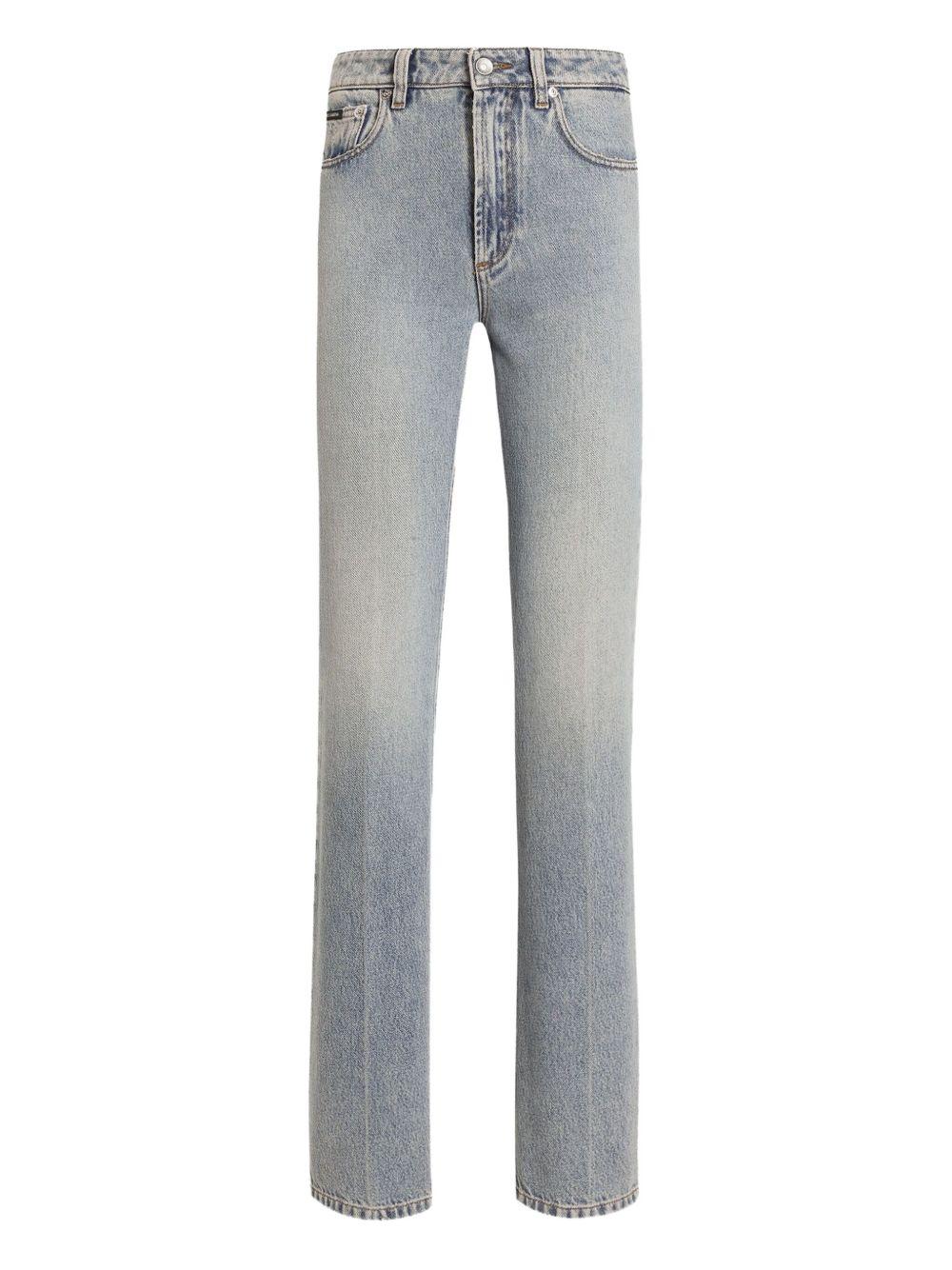 Jeans con placca logo 