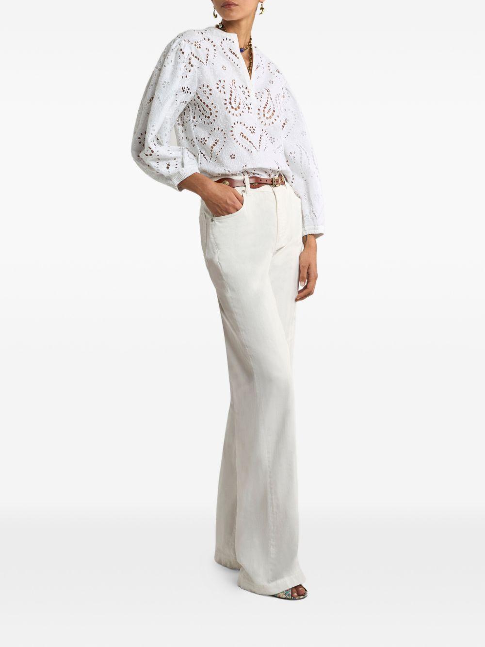Jeans con ricamo Pegaso 