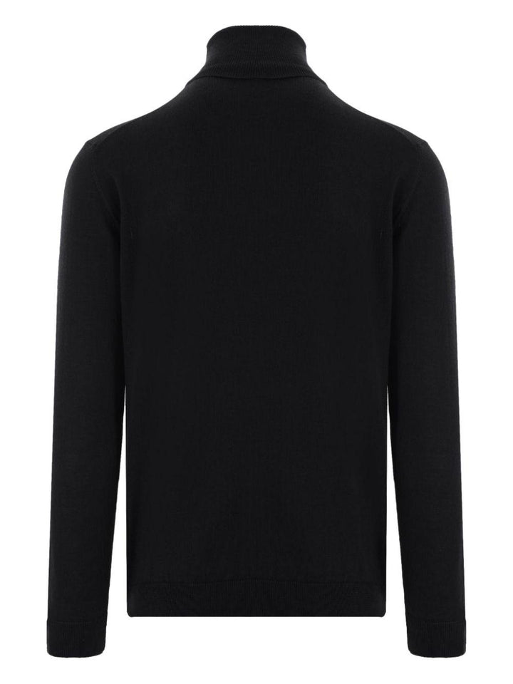 Maglione nero a collo alto in lana merino 