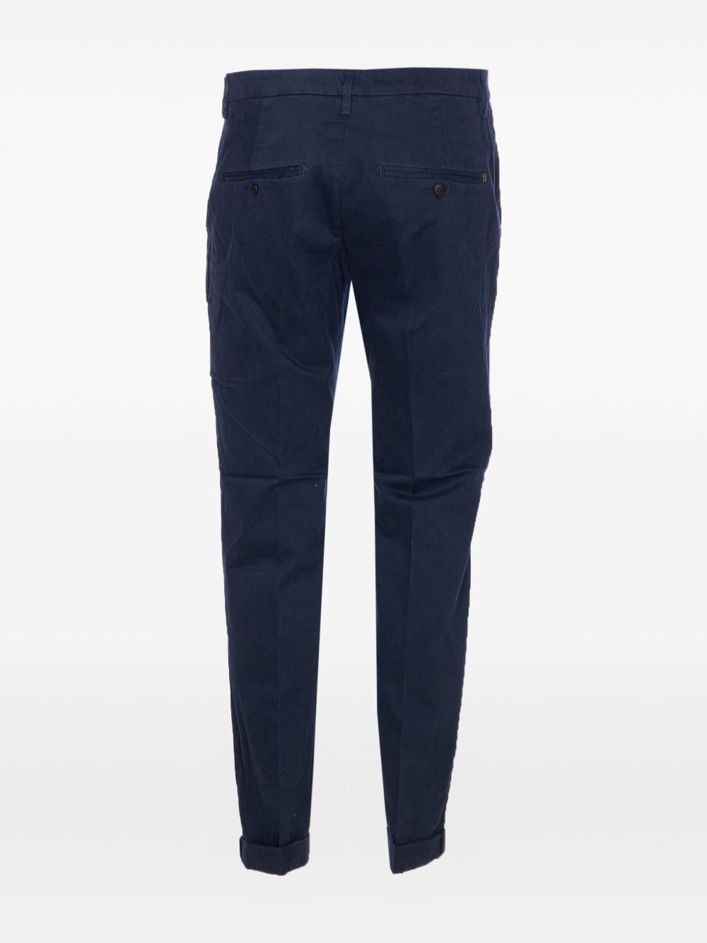 Chino blu in cotone con chiusura nascosta 