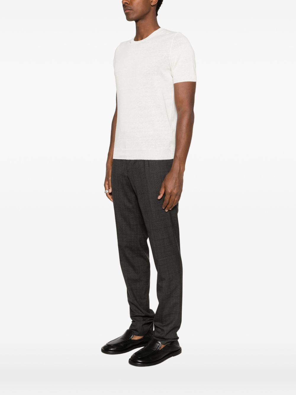 T-shirt bianca in maglia fine girocollo 