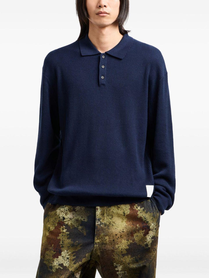Polo blu con applicazione logo 